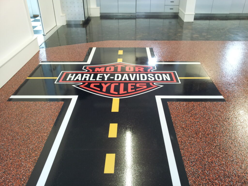 Custom Harley logo on epoxy chip floor.